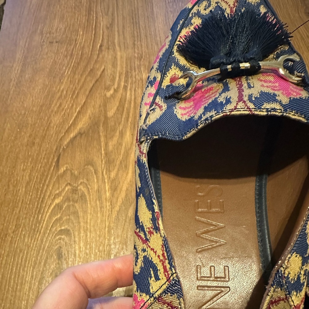 Multi colored tasseled shoe